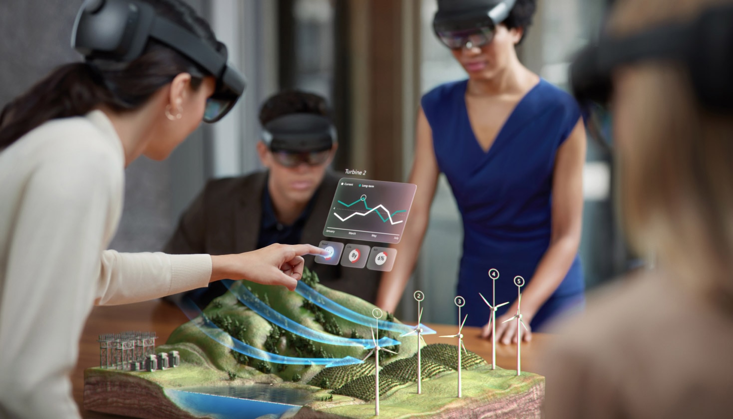 “A group of people working in augmented reality.” Image and alt text by Microsoft. Original image located here: https://dynamics.microsoft.com/en-us/mixed-reality/guides/what-is-augmented-reality-ar/